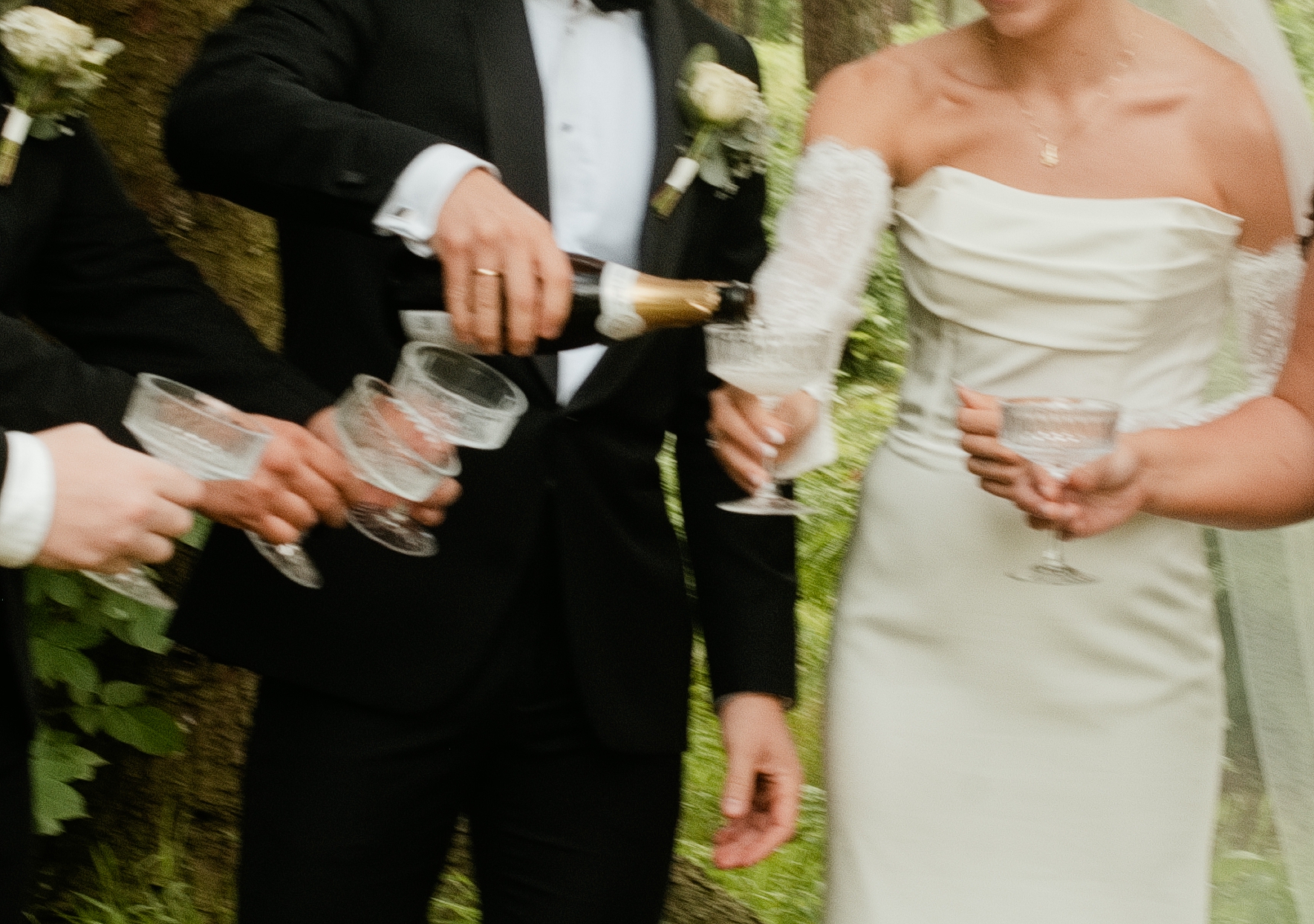 Champagne poured for the couple and their friends